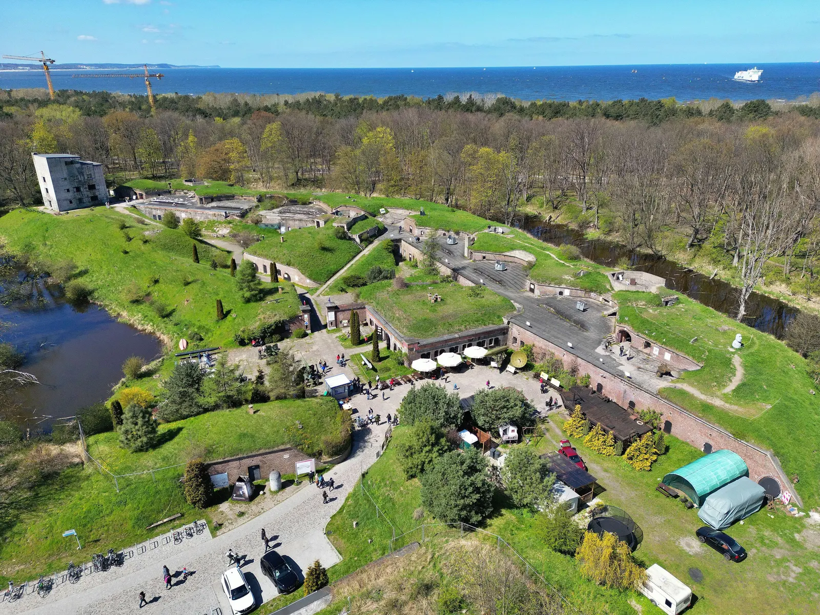 The West Fort from the air, with the sea and a ferry in the background